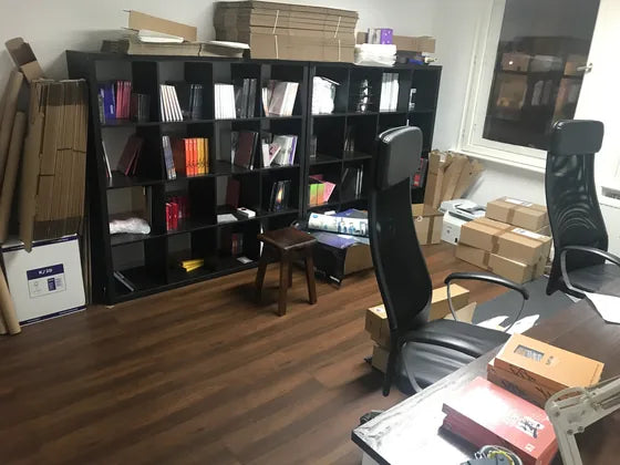 The first Nolae office, shelves stacked with albums